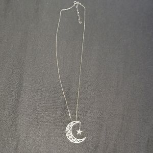 Intricate Silver Moon and Star Necklace